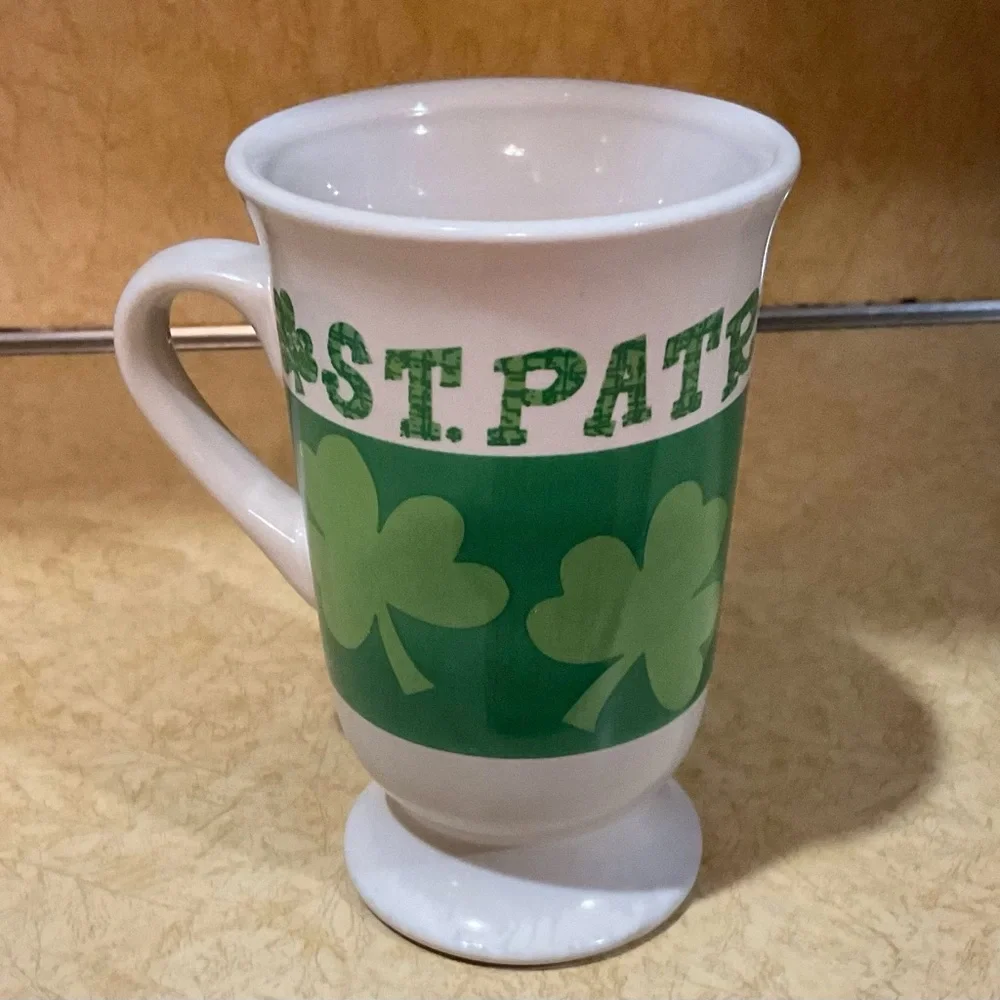 St. Patrick’s Day: mug, leprechaun, ngold plated/tone bracelet with green stone.